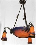 Lot#30, MULLER FRÈRES, FRENCH ART GLASS, 3-LIGHT CHANDELIER, C. 1925, H 33"3-light chandelier, fitted with Muller Frères art glass shades, decorated in orange and purple, with each shade signed, "Muller Fres. Luneville". Measuring H. 33" approximately, circa 1925.