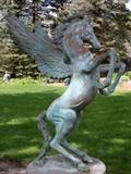 Lot#54, BRONZE PEGASUS, GARDEN SCULPTURE, H 57"The unsigned rearing bronze Pegasus garden sculpture has green patina.