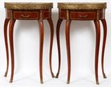 Lot#84, MAHOGANY, BRONZE ORMOLU AND MARBLE CONSOLE TABLES, C1930, PAIR, H 28", W 18", D 9"having a half round design with white marble tops with bronze galleries, mahogany with marquetry inlays in the skirt and single drawers, contoured legs with bronze ormolu at top and at the bottom of each leg. Inscribed on the underside of drawer: 'Made In Spain'.