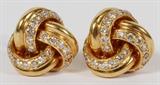Lot#98, 18 KT YELLOW GOLD AND DIAMOND EARRINGS, PAIR.Intertwined 18 KT yellow gold design each with twenty-four pave diamonds.