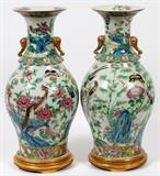 Lot#128, CHINESE FAMILLE ROSE PORCELAIN VASES, PAIR, H 19"Baluster form vases, each flanked by elephant mask handles, and decorated in butterfly, exotic bird and chrysanthemum motif. Measuring H. 18 3/4".