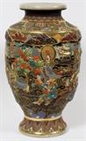 Lot#175, JAPANESE SATSUMA POTTERY VASE, H 25", DIA 14"Featuring figures of people and temples in relief.  Marked Made in Japan with marks.