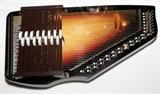 Lot#209, AUTOHARP, L 21", ENCASED/sunburst top, measures L.21 1/2" x 11", in a case.
