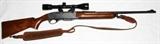 Lot#255, REMINGTON WOODMASTER, MODEL 740 RIFLE, .30-06 CAL. WITH BUSHNELL 4X SCOPE, L 28' BBL/Remington 'Woodmaster' Model 740 rifle, .30-06 Springfield cal. serial #90166, having a 28" blued barrel and receiver, trigger guard and trigger. Having a four round box magazine plus one round in the chamber. Walnut shoulder stock and forearm, shoulder strap rings and leather shoulder strap and pad. Includes a 4 X scope with sight ring mounts. Modern firearm, long gun firearms paperwork required, GA.