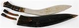 Lot#264, GURKHA KUKRI KNIFE, NEPAL, L 16"Includes a leather sheath, with smaller blades The two smaller blades are used for sharpening(chakmak)  and maintaining (Karda) the kukri. Measuring L. 16" overall, with the blade measuring L. 11".