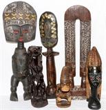 Lot#360, AFRICAN HAND-CARVED TRIBAL FIGURES, SIX, H 9"-20"Including one figural totem at H. 13 1/2", two full body figures at H. 18" and 20", together with one bust, one monkey figure, and a carved double headed sculpture. Four of the six feature hammered metal detailing, and two have beaded designs along the face.