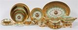 Lot#1061, LE MIEUX GOLD DECORATED PORCELAIN DINNER SET, 181 PIECES (SERVICE FOR TWELVE)12 coffee cups, 12 tea cups, 12 saucers, 12 cream soups, 12 cream soup under plates, 12 soup bowls dia     ", 12 service plates  @   ", 12 dinner plates @   ", 12 luncheon plates @      ", 24 salad or dessert plates @     ", 12 bread plates @    ",  1 covered vegetable dish      ", 1 covered soup tureen     ", 1 gravy boat with attached under plate, 1 sauce boat, 1 open vegetable dish      ", 4 platters     ",      ",   "      ",   2 creamers, 2 covered sugar bowls, 23 individual salt and peppers, 1 master salt and pepper.