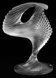 Lot#1090, LALIQUE 'TROPHEE' MOLDED & FROSTED GLASS SCULPTURE, H 13"In the form of a stylized flame; signed "Lalique France" at the edge of the base, with a fitted box.  Measures H.13" x 9".