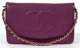 Lot#1180, CHANEL CAVIAR PURPLE LEATHER SHOULDER BAG, W 7 1/2"A single flap at the front, clipping open to an interior with two zippered pockets, and six card sleeves. Stamped: Chanel, Made in France in gold. Measuring H.5" x 7 1/2", L. 24".