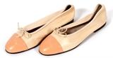 Lot#1184, CHANEL TWO-TONE LEATHER BALLET FLATS, PAIR, SIZE 37.A pair of tan leather ballet flats, with peach tone leather at the toe. Stamped: Chanel, Made in Italy in gold, Euro size 37.