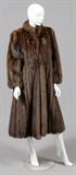 Lot#1197, REVILLON SABLE COAT FOR SAKS FIFTH AVENUE, L 47"A single button at the collar, two hooks below, flanked by slit pockets, embroidered monogram at the lining.  Measures 47" from shoulder to hem.  Labeled: Revillon; Saks Fifth Avenue.