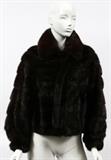 Lot#1201, LADY'S MINK JACKET, H 25" W 19"Zippered front, with necktie. Size 2-4 approximately, measuring H. 25" x 19", L. 22" to the shoulder.