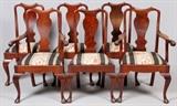Lot#1254, QUEEN ANNE STYLE DINING CHAIRS, SET OF SIX.Including 2 armchairs and 4 side chairs; each has a shaped rail above a vasiform splat, upholstered seat, raised on cabriole legs ending in pad feet.