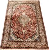 Lot#1271, SINO-PERSIAN SILK RUG, 10' 6" X 6' 11"Fine weave with center medallion and overall, multi-colored, floral and leaf designs.
