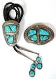 Lot#1302, EFFIE CALAVAZA, ZUNI SILVER & TURQUOISE BOLO & BELT BUCKLE, W 3"Set of 2 pieces including a bolo tie with braided cord and a belt buckle, W.3 1/4" x 2"; each piece features a double snake motif encircling turquoise stones, signed "Effie C., Zuni" (see additional photo).