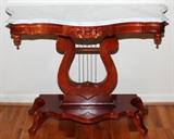 Lot#1555, VICTORIAN STYLE MAHOGANY TABLE WITH MARBLE TOP, H 31", W 40", D 17"A white marble top raised on a lyre-form base with four feet.