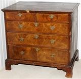 Lot#2044, EARLY GEORGIAN WALNUT CHEST OF DRAWERS, C. 1720, H 30", W 33", D 19"Walnut, walnut veneer and oak, fitted with two short drawers above three long drawers of graduated size, each has a herringbone cross-banded margin, batwing post and bail brasses, raised on bracket feet.  Measures H.29 3/4" x 33" x 19 1/2".