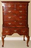 Lot#2046, CHIPPENDALE YEW WOOD HIGHBOY, C. 1780, H 72", W 42", D 20"Yew wood veneer on pine, having a beveled cornice above two short drawers and three long drawers of graduated size, the lower case is fitted with three drawers, all having cockbeaded margins and pierced batwing brasses and escutcheon plates, raised on cabriole legs with shell carved knees and ball-and-claw feet.