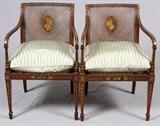 Lot#2050, REGENCY STYLE BLACK OPEN ARM CHAIRS PAIR.loose seat cushions, painted black frames, cane seat panels and back panel, H 32" W 21" D 19".