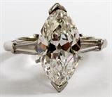 Lot#2066, MARQUISE DIAMOND & PLATINUM RING, 4.18 CT. WITH 2 BAGUETTES, GIA CERTIFICATION.Marquise diamond is H color, VS1 clarity.  Tests as platinum, 6.8 grams total weight; ring size:  6.5 plus; ring sizer insert for smaller size.