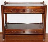 Lot#2166, TROSBY FURNITURE OF SUSSEX, ENGLAND WALNUT SERVER, H 36", W 48", D 20"Fitted with four drawers and pull-out serving slide.  Original label within (see additional photo).