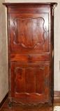 Lot#2170, FRENCH PROVINCIAL WALNUT CABINET, C. 1800, H 81", W 33", D 24"Cherry with walnut secondary wood, in bonnetiere form, fitted with upper and lower cabinet doors, and a single drawer between.