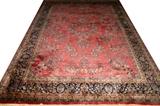 Lot#2271, KASHAN WOOL AND SILK CARPET, W 8' 1", L 11' 2"Central rose ground with overall flower and leaf designs.  Seven borders.