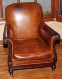 Lot#2361, LILLIAN AUGUST COLLECTION BROWN LEATHER ARMCHAIR.Nail head trim.