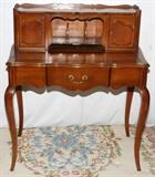 Lot#2481, FRENCH STYLE MAHOGANY LADY'S DESK, H 39", W 33", D 20"Envelope slots flanked by small doors, fitted with a single drawer below, raised on elongated cabriole supports.  Mid 20th century.