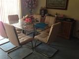 Glass top table with six chairs