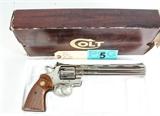 Lot#:	5
Description:	Gun Colt Python Nickel 8" NIB
A vintage Colt Python like new in box and appears to be unfired with original booklet. A beautiful factory nickel finish with an original 8" barrel. An extremely rare revolver. Made in 1980. A must have for anyone who collects Colt Revolvers. Seldom offered with this barrel length in unfired condition!. Inventory #D4238 Colt Model Python in 357 Magnum Caliber Serial Number VA6099 Double Action Revolver. 