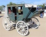 Lot#:	1
Description:	Western Memorabilia Stagecoach Replica
This is 1 of 70 wagons that will be sold between November 2014 and February 2015!
Take a trip back in time when the Old West, or the Wild West, was being explored and settled. The buggies, carriages, wagons and coaches featured in this auction are authentic relics of the frontier history. These items are from the Richard Bunger Estate in Payson, AZ and were purchased by Mr. Bunger from various places including the McElhaney Cattle Co Museum in Yuma, AZ. This lot features a Stagecoach replica: three quarter scale metal reinforced wood and wood product (plywood) stage coach; steel rod gallery around top for luggage; open driver's seat in front with brake lever at side; two facing benches inside with door in center; open window windows and coach lamp on each side; mounted on steel and wood undercarriage, mounted on hard rubber rimmed wood spoke wheels; body of carriage painted green, undercarriage, wheels and driver's seat painte
