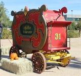 Lot#:	139
Description:	Antique Calliope Style Horse Drawn Wagon
This is 1 of 70 wagons that will be sold between November 2014 and February 2015!
Take a trip back in time when the Old West, or the Wild West, was being explored and settled. The buggies, carriages, wagons and coaches featured in this auction are authentic relics of the frontier history. These items are from the Richard Bunger Estate in Payson, AZ and were purchased by Mr. Bunger from various places including the McElhaney Cattle Co Museum in Yuma, AZ. This lot features an advertising calliope style wagon. Made from wood and molded wood with a steel carriage with scrolled plume relief enclosed side panels. The center of the panels feature a plumed cartouche with stenciling in the center which reads, "Miller 6 Pony Hitch". The box is painted red, plumes and relief are metallic gold with dark green accents in the backgrounds. It has a wood and steel under-carriage and tongue is painted yellow. The steel rimmed wheels are pa