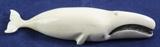 Lot#:	208
Description:	Vintage Alaskan Inuit Ivory Carved Whale Figurine
Gorgeous vintage carved ivory whale figurine. This piece is caved from a single piece and has amazing features! Statuette depicts a white whale with black stained open mouth and eyes. The piece has a couple of small stress cracks; one on each side near the pectoral fins. Unmarked, unknown age or origin. Listed as ivory based on information provided by consigner. Measures: 1" tall x 6" long.
Tag words: figure, Japanese, folklore, Chinese, scrimshaw, Alaska, Oriental, Netsuke