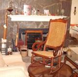 Cane Rocking Chair.  Walking Sticks, Hummels, crocks, pottery, etc.