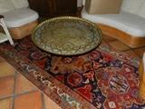 Oriental rug and Moroccan brass table