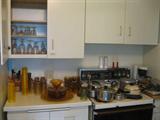 kitchen in full and many extra clean vintage Items and glassware. silverware etc.