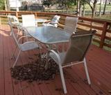 Rectangular Outdoor Table And Chairs Table: 66X36X27. 4 Chairs: 23X35X40. All show some wear but in overall good condition. Includes umbrella stand.