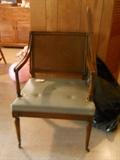 cane chair leather/wheels