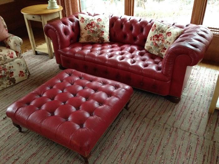 tufted leather couch and ottoman 