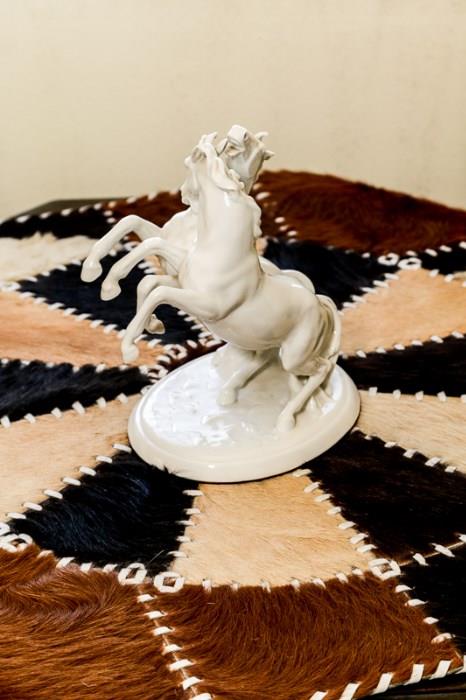 Horse figurine, animal hide patchwork