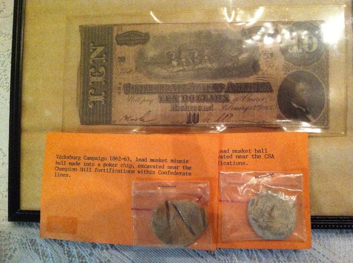 confederate money along with two poker chips dug at Vicksburg battle site