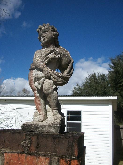 we have over a dozen concrete cherubs from large to huge available for sale