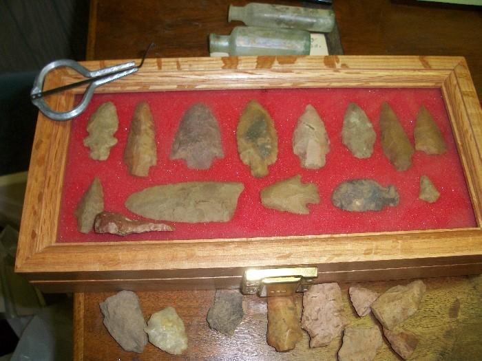 a large collection of arrow heads AND a Jew's Harp