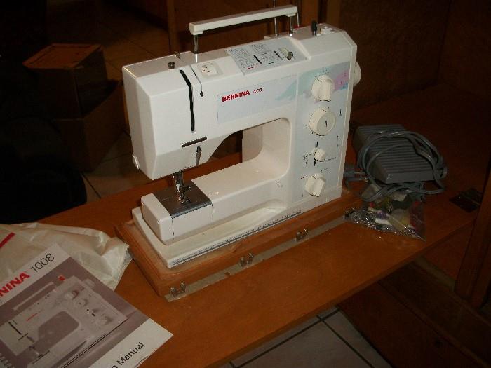 a fabulous Bernina Sewing Machine--One of the armoires have been fitted to hold sewing machine which you can purchase separately
