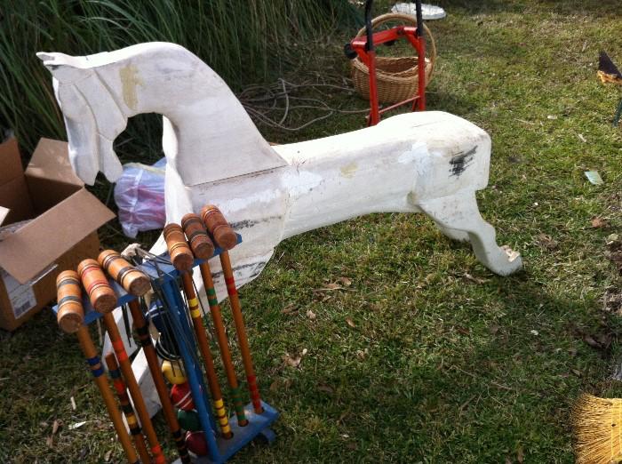 HUGE carved wooden horse and notice the vintage croquet set