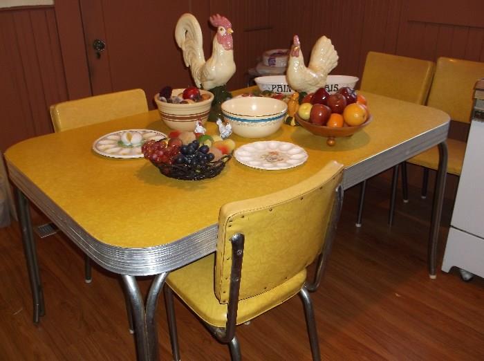 1950's yellow formica kitchen table w/leaf and six chairs