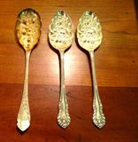 THREE "BERRY" SPOONS