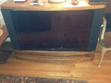FLAT SCREEN LCD TV
APPROX 42"
SET INSIDE A WOOD CABINET