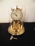 German clock. {Glass dome w/up}
